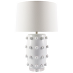 Table lamp with textured white base and gray shade on a white background