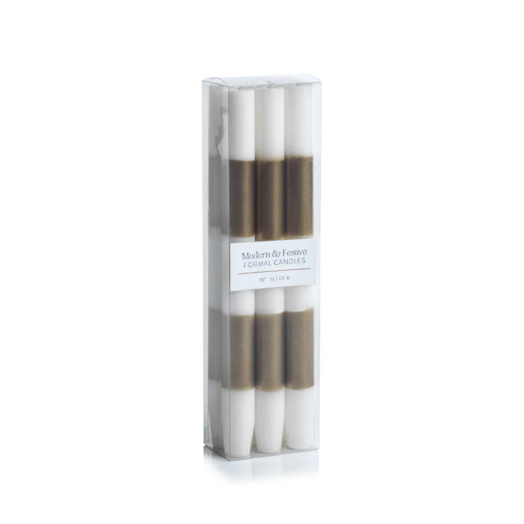 Set of three candles in a clear packaging box on a white background