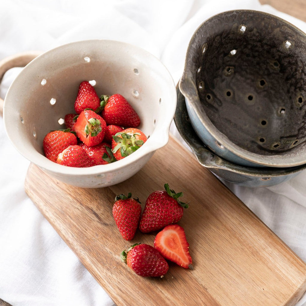 stoneware Berry Bowl filled with strawberries 