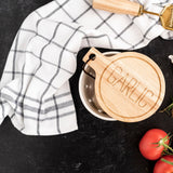 Black Dish Towel with cheese grater and garlic holder on black background