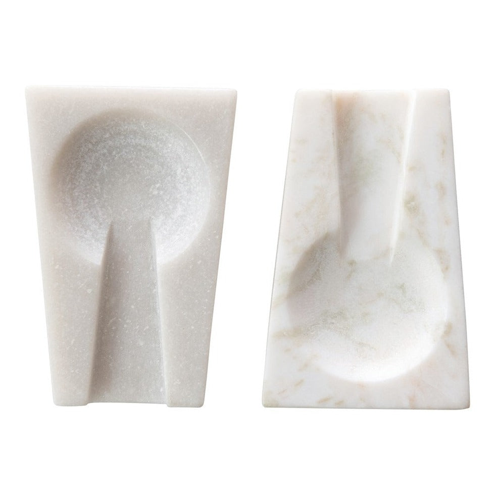 white marble spoon rest on white background