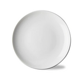 Oversized white dinner plate with white background