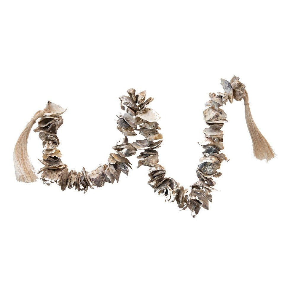 oyster shell decor garland on white background