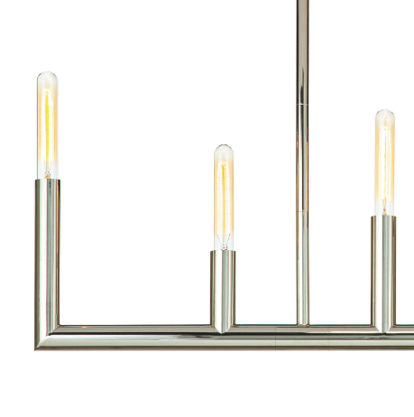 Silver chandelier with lights on white wall.