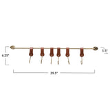 brass rod with leather hooks on white background with measurements. 29.5" long and 1.5" deep 