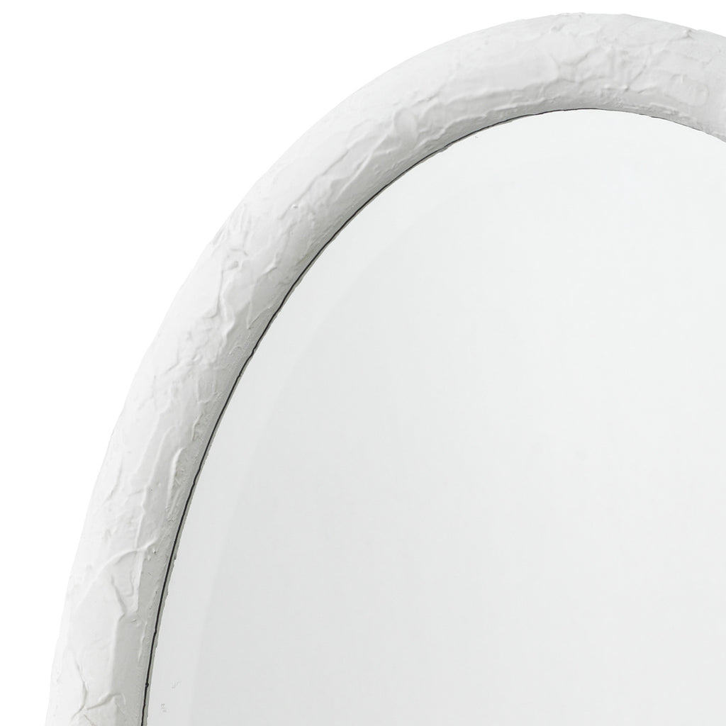 Ovation white oval mirror on white wall.