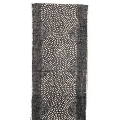 table runner with dot pattern on white background