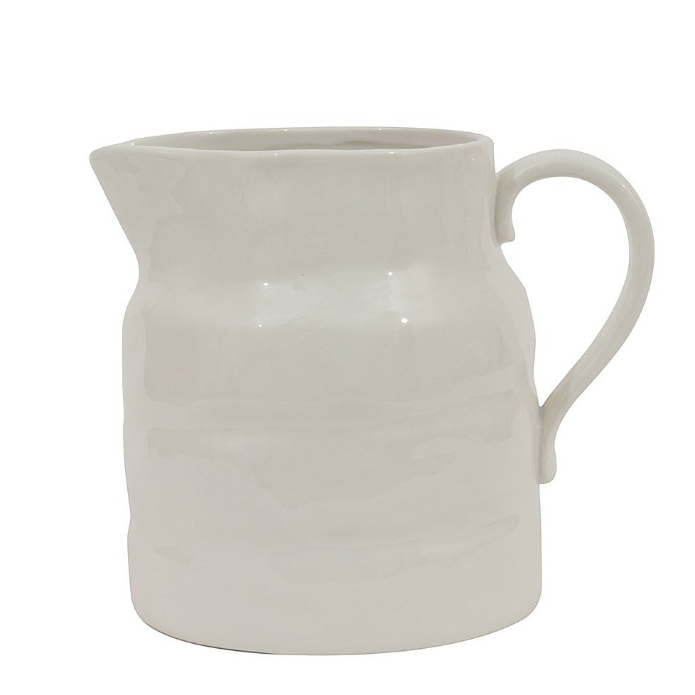 white stoneware pitcher with handle